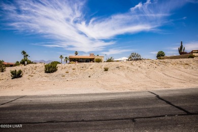 This remarkable corner lot boasts a captivating view of a on London Bridge Golf Course in Arizona - for sale on GolfHomes.com, golf home, golf lot