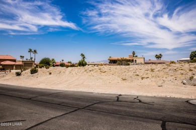 This remarkable corner lot boasts a captivating view of a on London Bridge Golf Course in Arizona - for sale on GolfHomes.com, golf home, golf lot