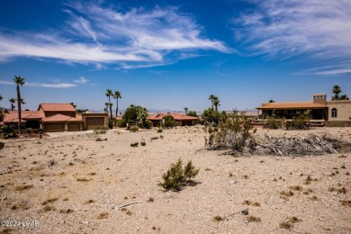 This remarkable corner lot boasts a captivating view of a on London Bridge Golf Course in Arizona - for sale on GolfHomes.com, golf home, golf lot