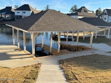 Waterfront - Boathouse - Two Boat Slips - Resort-Style Living on Lake Caroline Golf Club in Mississippi - for sale on GolfHomes.com, golf home, golf lot