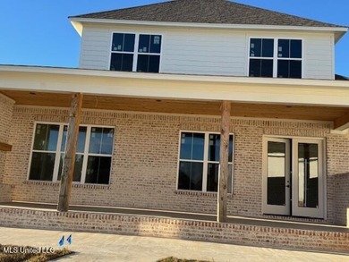 Waterfront - Boathouse - Two Boat Slips - Resort-Style Living on Lake Caroline Golf Club in Mississippi - for sale on GolfHomes.com, golf home, golf lot