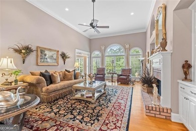 This exquisite four-sided blush brick estate is the epitome of on Royal Lakes Golf and Country Club in Georgia - for sale on GolfHomes.com, golf home, golf lot