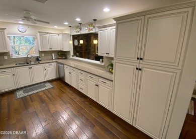 This beautiful home boasts a newer December 2024 roof and is in on Tomoka Oaks Golf and Country Club in Florida - for sale on GolfHomes.com, golf home, golf lot