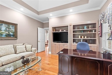 This exquisite four-sided blush brick estate is the epitome of on Royal Lakes Golf and Country Club in Georgia - for sale on GolfHomes.com, golf home, golf lot