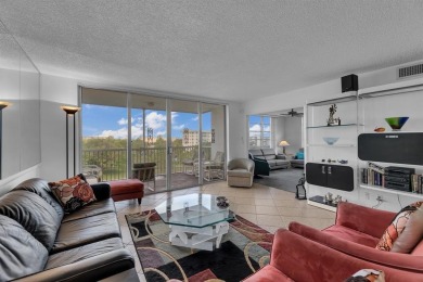 NEW  PRICE REDUCTION!!!!  3 BEDROOM CORNER UNIT!! WATER VIEW on Palm-Aire Country Club and Resort - Palms in Florida - for sale on GolfHomes.com, golf home, golf lot