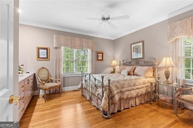 This exquisite four-sided blush brick estate is the epitome of on Royal Lakes Golf and Country Club in Georgia - for sale on GolfHomes.com, golf home, golf lot