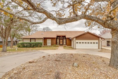 Welcome to this beautifully refreshed 3 bedroom, 2 bath on De Cordova Bend Country Club in Texas - for sale on GolfHomes.com, golf home, golf lot