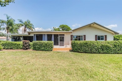 Under contract-accepting backup offers. Welcome to your dream on Countryside Country Club in Florida - for sale on GolfHomes.com, golf home, golf lot