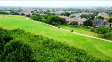Fall in love with golden sunsets and golf course views! No on The Trails of Frisco Golf Club in Texas - for sale on GolfHomes.com, golf home, golf lot