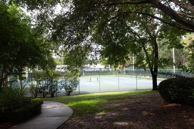 Under contract-accepting backup offers. TWO MASTER SUITES o GOLF on Royal Oaks Golf Club in Florida - for sale on GolfHomes.com, golf home, golf lot