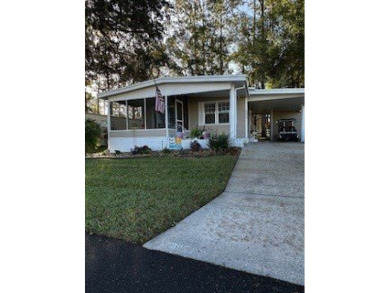 *This home is located in a 55+ resort style leased land on Rolling Greens Executive Golf Community in Florida - for sale on GolfHomes.com, golf home, golf lot