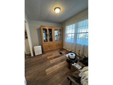 *This home is located in a 55+ resort style leased land on Rolling Greens Executive Golf Community in Florida - for sale on GolfHomes.com, golf home, golf lot
