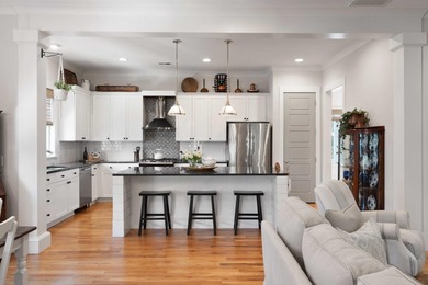 A true elevated Lowcountry retreat tucked away on a quiet cul de on Charleston National Golf Club in South Carolina - for sale on GolfHomes.com, golf home, golf lot