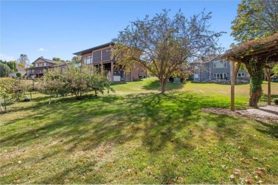 Classic and timeless, this quality built two-story home is on New Prague Golf Club in Minnesota - for sale on GolfHomes.com, golf home, golf lot