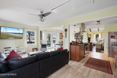 Experience waterfront living at its finest at 5802 E Yacht Drive on Founders Club At St. James Plantation in North Carolina - for sale on GolfHomes.com, golf home, golf lot
