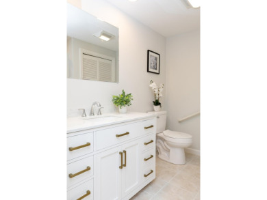 This turnkey home has been thoughtfully updated throughout on The Golf Club At Southport in Massachusetts - for sale on GolfHomes.com, golf home, golf lot