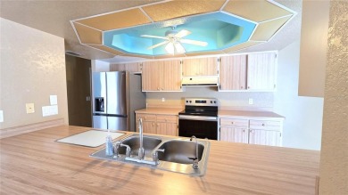 Whether you're looking for a family home or a vacation retreat on Sabal Trace Golf and Country Club in Florida - for sale on GolfHomes.com, golf home, golf lot