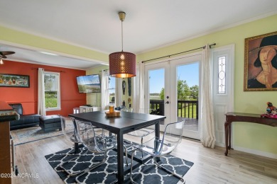Experience waterfront living at its finest at 5802 E Yacht Drive on Founders Club At St. James Plantation in North Carolina - for sale on GolfHomes.com, golf home, golf lot