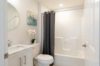 This turnkey home has been thoughtfully updated throughout on The Golf Club At Southport in Massachusetts - for sale on GolfHomes.com, golf home, golf lot