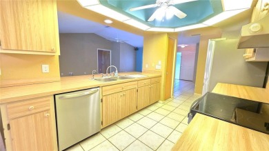 Whether you're looking for a family home or a vacation retreat on Sabal Trace Golf and Country Club in Florida - for sale on GolfHomes.com, golf home, golf lot