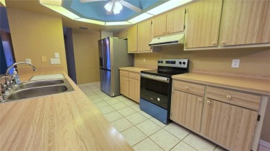 Whether you're looking for a family home or a vacation retreat on Sabal Trace Golf and Country Club in Florida - for sale on GolfHomes.com, golf home, golf lot