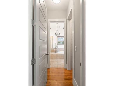 A true elevated Lowcountry retreat tucked away on a quiet cul de on Charleston National Golf Club in South Carolina - for sale on GolfHomes.com, golf home, golf lot