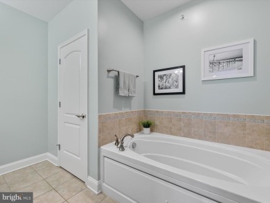 Beautiful three-bedroom, three full bath condominium showcasing on The Peninsula Golf and Country Club in Delaware - for sale on GolfHomes.com, golf home, golf lot