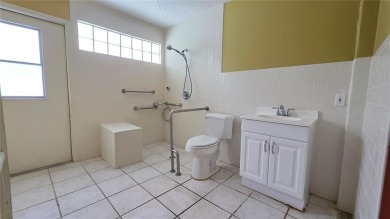 Whether you're looking for a family home or a vacation retreat on Sabal Trace Golf and Country Club in Florida - for sale on GolfHomes.com, golf home, golf lot