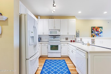 Top-floor, end-unit condo in the desirable Woodlands at Crow on Crow Creek Golf Club in North Carolina - for sale on GolfHomes.com, golf home, golf lot