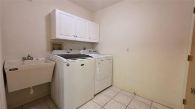 Whether you're looking for a family home or a vacation retreat on Sabal Trace Golf and Country Club in Florida - for sale on GolfHomes.com, golf home, golf lot