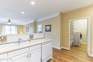Top-floor, end-unit condo in the desirable Woodlands at Crow on Crow Creek Golf Club in North Carolina - for sale on GolfHomes.com, golf home, golf lot