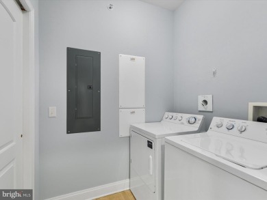 Beautiful three-bedroom, three full bath condominium showcasing on The Peninsula Golf and Country Club in Delaware - for sale on GolfHomes.com, golf home, golf lot