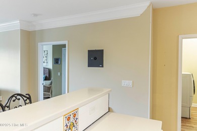 Top-floor, end-unit condo in the desirable Woodlands at Crow on Crow Creek Golf Club in North Carolina - for sale on GolfHomes.com, golf home, golf lot