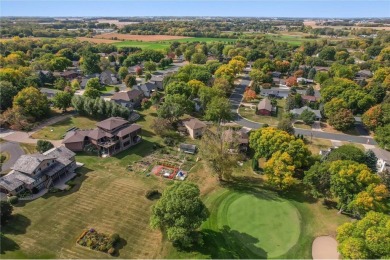 Classic and timeless, this quality built two-story home is on New Prague Golf Club in Minnesota - for sale on GolfHomes.com, golf home, golf lot