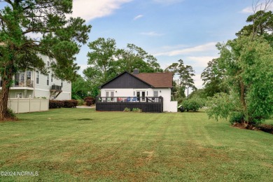 Experience waterfront living at its finest at 5802 E Yacht Drive on Founders Club At St. James Plantation in North Carolina - for sale on GolfHomes.com, golf home, golf lot