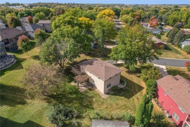 Classic and timeless, this quality built two-story home is on New Prague Golf Club in Minnesota - for sale on GolfHomes.com, golf home, golf lot