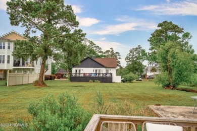 Experience waterfront living at its finest at 5802 E Yacht Drive on Founders Club At St. James Plantation in North Carolina - for sale on GolfHomes.com, golf home, golf lot
