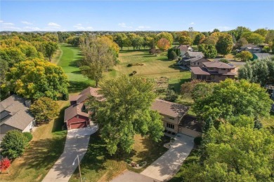 Classic and timeless, this quality built two-story home is on New Prague Golf Club in Minnesota - for sale on GolfHomes.com, golf home, golf lot