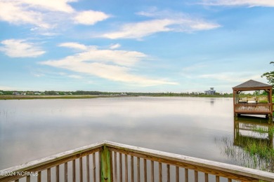 Experience waterfront living at its finest at 5802 E Yacht Drive on Founders Club At St. James Plantation in North Carolina - for sale on GolfHomes.com, golf home, golf lot