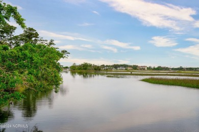 Experience waterfront living at its finest at 5802 E Yacht Drive on Founders Club At St. James Plantation in North Carolina - for sale on GolfHomes.com, golf home, golf lot