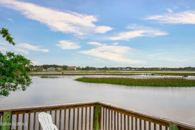Experience waterfront living at its finest at 5802 E Yacht Drive on Founders Club At St. James Plantation in North Carolina - for sale on GolfHomes.com, golf home, golf lot