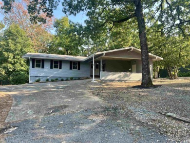 Welcome to 5 Vitoria Lane, a beautifully remodeled 3-bedroom on Cortez Golf Course in Arkansas - for sale on GolfHomes.com, golf home, golf lot