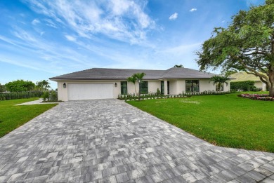 This magnificent executive home is now Complete! This modern and on Delray Dunes Golf and Country Club in Florida - for sale on GolfHomes.com, golf home, golf lot