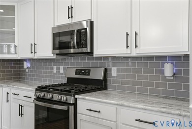 Welcome to this delightfully maintained and upgraded townhome in on The Westham Golf Club At Magnolia Green in Virginia - for sale on GolfHomes.com, golf home, golf lot