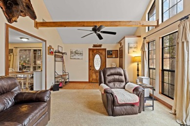 Enjoy this darling 2 bedroom & 2 bath home on two lots with two on Holly Lake Ranch Golf Club in Texas - for sale on GolfHomes.com, golf home, golf lot