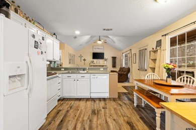 Enjoy this darling 2 bedroom & 2 bath home on two lots with two on Holly Lake Ranch Golf Club in Texas - for sale on GolfHomes.com, golf home, golf lot