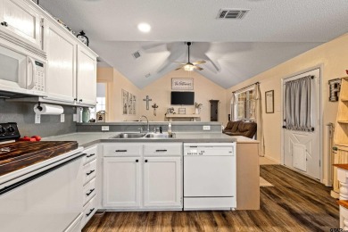 Enjoy this darling 2 bedroom & 2 bath home on two lots with two on Holly Lake Ranch Golf Club in Texas - for sale on GolfHomes.com, golf home, golf lot