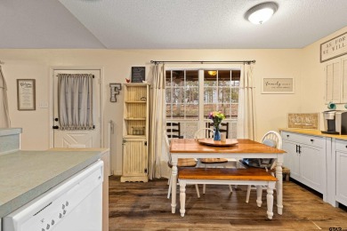 Enjoy this darling 2 bedroom & 2 bath home on two lots with two on Holly Lake Ranch Golf Club in Texas - for sale on GolfHomes.com, golf home, golf lot