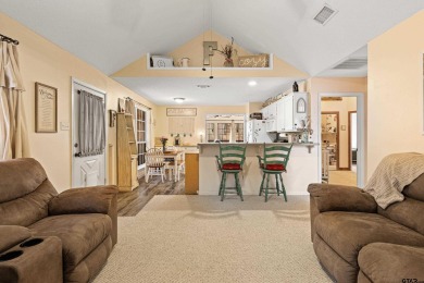 Enjoy this darling 2 bedroom & 2 bath home on two lots with two on Holly Lake Ranch Golf Club in Texas - for sale on GolfHomes.com, golf home, golf lot