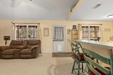 Enjoy this darling 2 bedroom & 2 bath home on two lots with two on Holly Lake Ranch Golf Club in Texas - for sale on GolfHomes.com, golf home, golf lot